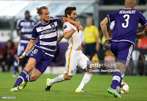 Guillaume Gillet of Anderlecht and Joao Moutinho of Monaco in action during the UEFA Europa League match between RSC Anderlecht and AS Monaco FC at...