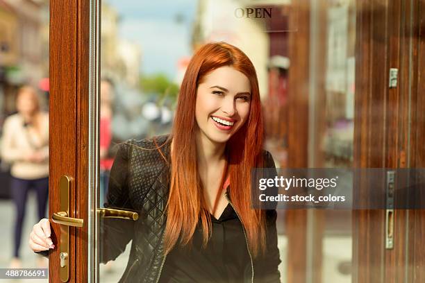 lifestyle woman portrait - entering restaurant stock pictures, royalty-free photos & images