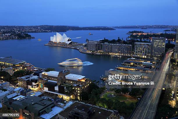 twilight view of opera house and circular quay - circular quay stock pictures, royalty-free photos & images