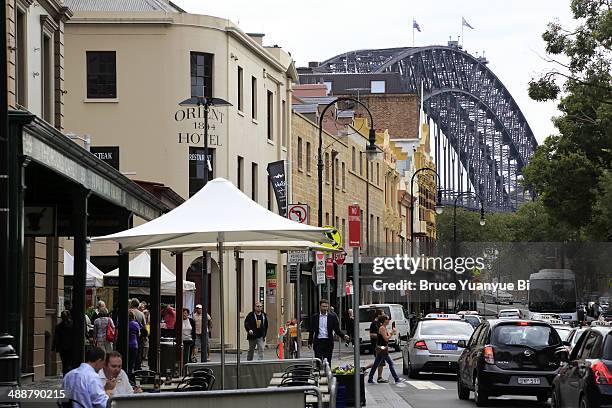 street view of the rocks with harbour bridge - the rocks sydney stock pictures, royalty-free photos & images