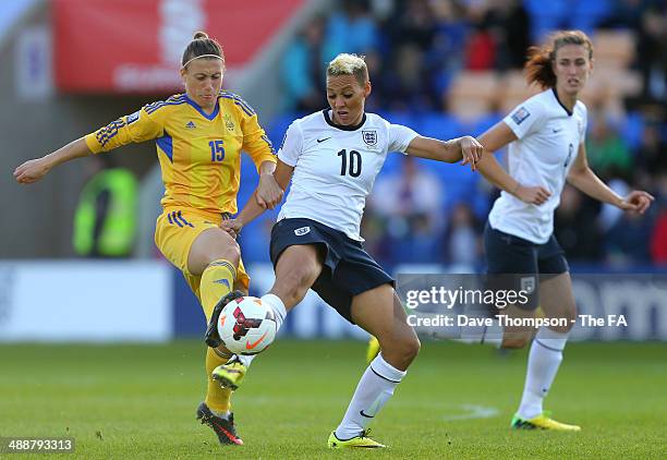 Lianne Sanderson of England and Iya Andrushchak of Ukraine compete for the ball during FIFA Women's World Cup Qualifier between England and Ukraine...