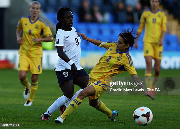 Eniola Aluko of England and Ol'ha Boichenko of the Ukraine challenge for trhe ball during the FIFA Women's World Cup Qualifier match between England...