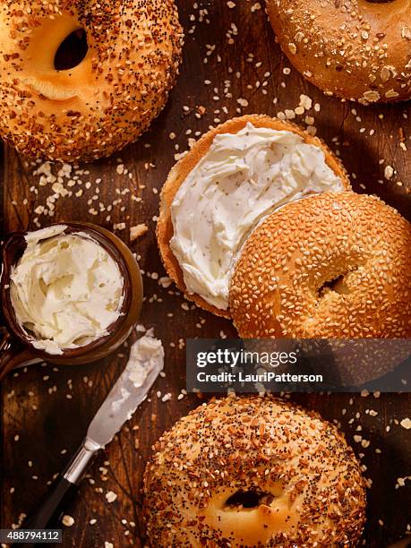 bagels and cream cheese - bagels stock pictures, royalty-free photos & images