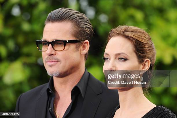 Brad Pitt and Angelina Jolie attend the 'Maleficent' Costume And Props Private Reception at Kensington Palace on May 8, 2014 in London, England.