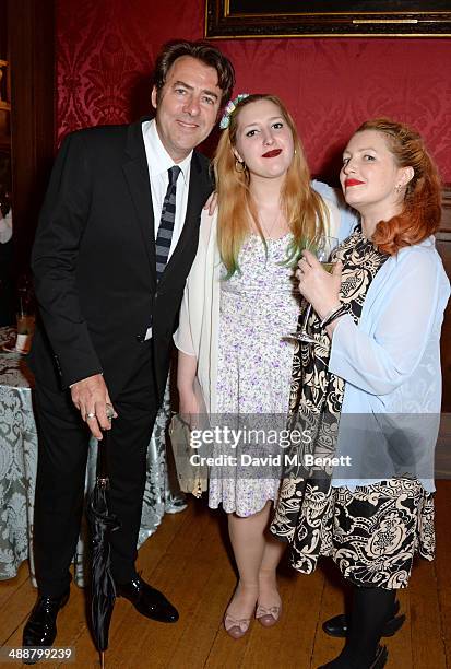 Jonathan Ross, Honey Kinney Ross and Jane Goldman attend a private reception as costumes and props from Disney's "Maleficent" are exhibited in...