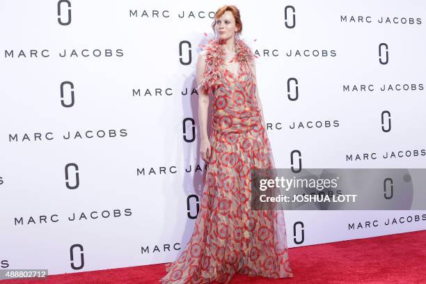 British model Karen Elson presents a creation by Marc Jacobs during the Spring/Summer 2016 collection at New York Fashion Week in New York on...