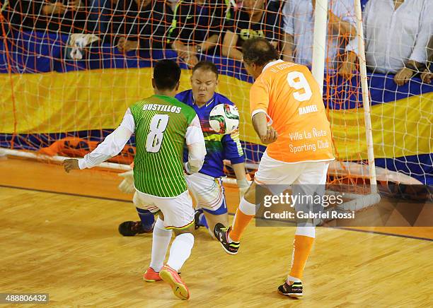 Daniel Scioli Governor of Buenos Aires, kicks the ball to score during a Copa Juana Azurduy match at Villa La Ñata Stadium as part of Evo Morales,...