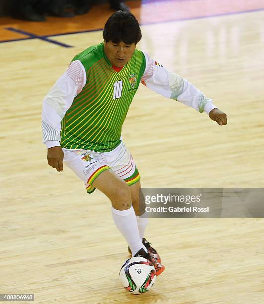 Evo Morales, President of Bolivia drives the ball during a Copa Juana Azurduy match at Villa La Ñata Stadium as part of Evo Morales, President of...