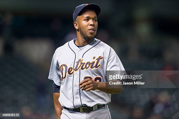 Relief pitcher Neftali Feliz of the Detroit Tigers walks off the field between innings against the Cleveland Indians during game two of a double...