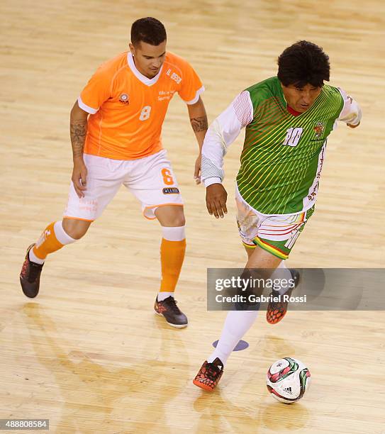 Evo Morales, President of Bolivia drives the ball during a Copa Juana Azurduy match at Villa La Ñata Stadium as part of Evo Morales, President of...