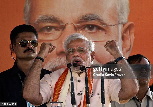 Leader Narendra Modi gestures during his speech at a rally by the leader on May 8, 2014 in Rohaniya, near Varanasi India. Thousands of supporters...