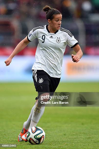 Lena Lotzen of Germany runs with the ball during the FIFA Women's World Cup 2015 Qualifier between Germany and Slovakia at Osnatel Arena on May 8,...