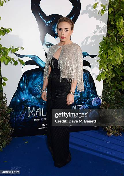 Chloe Green arrives at a private reception as costumes and props from Disney's "Maleficent" are exhibited in support of Great Ormond Street Hospital...