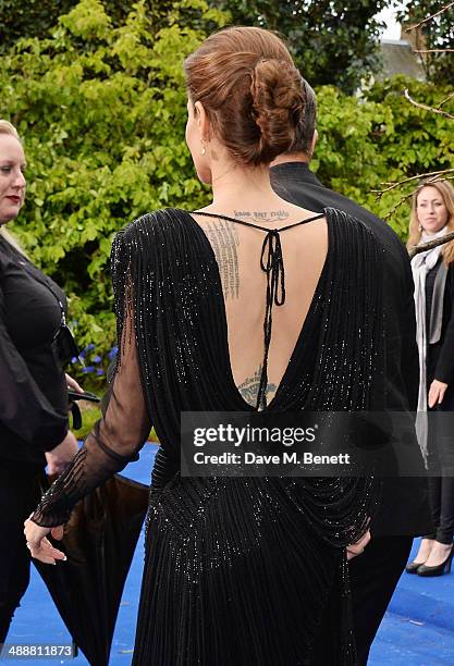 Angelina Jolie arrives at a private reception as costumes and props from Disney's "Maleficent" are exhibited in support of Great Ormond Street...