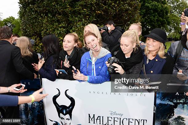 General view of the atmosphere at a private reception as costumes and props from Disney's "Maleficent" are exhibited in support of Great Ormond...