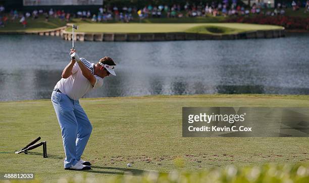 Charlie Beljan of the United States hits his tee shot on the 17th hole during the first round of THE PLAYERS Championship on The Stadium Course at...