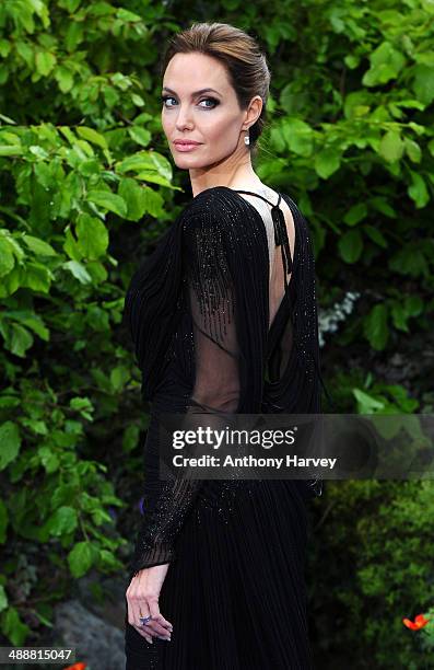 Angelina Jolie attends a private reception as costumes and props from Disney's "Maleficent" are exhibited in support of Great Ormond Street Hospital...