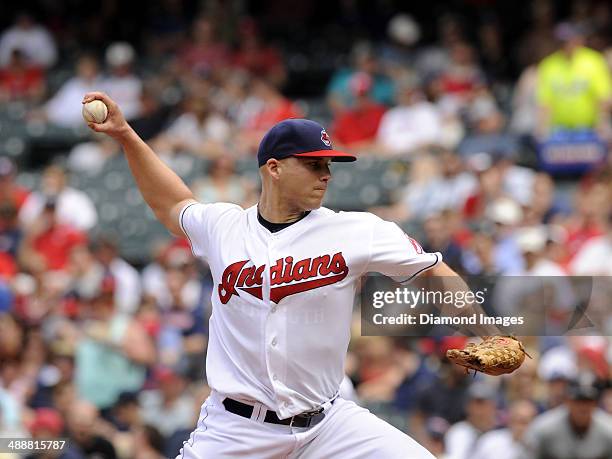 Pitcher Justin Masterson of the Cleveland Indians throws a pitch during a game against the Minnesota Twins on May 8, 2014 at Progressive Field in...