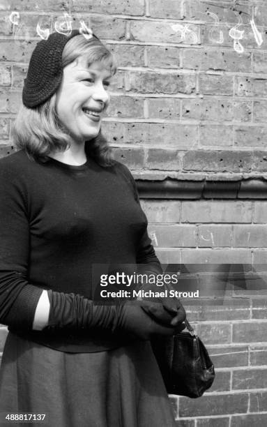 Roberta Cowell posing outdoors, 1958. Cowell, a former racing driver and RAF pilot was the first person to undergo gender reassignment surgery in the...
