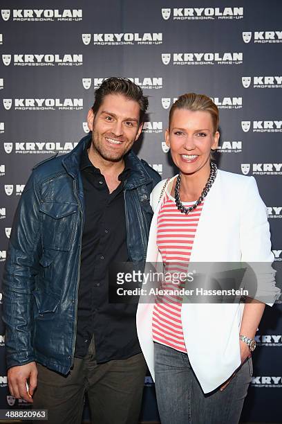 Alexandra Rietz attends with Bane Katic the Kryolan Make-Up Shop Opening on May 8, 2014 in Munich, Germany.