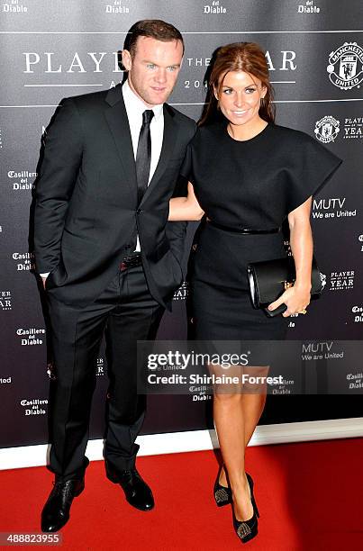 Wayne Rooney and Coleen Rooney attend the Manchester United Player of the Year awards at Old Trafford on May 8, 2014 in Manchester, England.