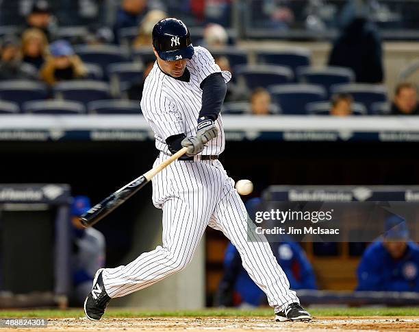 Scott Sizemore of the New York Yankees in action against the Chicago Cubs during game two of a doubleheader at Yankee Stadium on April 16, 2014 in...