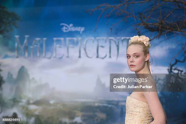 Elle Fanning attends a private reception as costumes and props from Disney's "Maleficent" are exhibited in support of Great Ormond Street Hospital at...