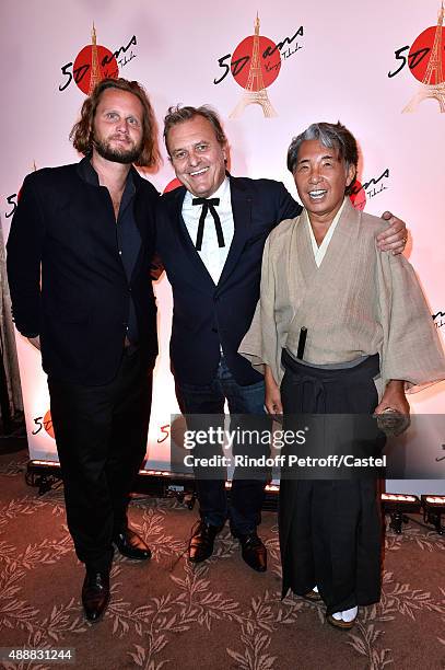 Fashion Designer Jean-Charles de Castelbajac standing between his son Guilhem de Castelbajac and Kenzo Takada attend the Kenzo Takada's 50 Years of...