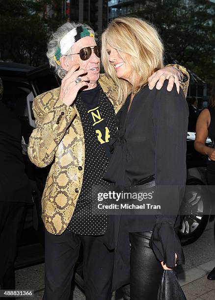Patti Hansen and Keith Richards arrive at the "Keith Richards: Under The Influence" premiere during 2015 Toronto International Film Festival held at...