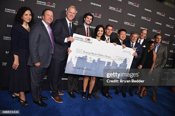 Boomer Esiason, Demi Lovato, Rob Thomas, President and CEO for Samsung Electronics North America Gregory Lee, Tony Bennett, President and COO for...