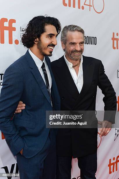 Actor Dev Patel and actor Jeremy Irons attends the premiere of 'The Man Who Knew Infinity' at Roy Thomson Hall on September 17, 2015 in Toronto,...