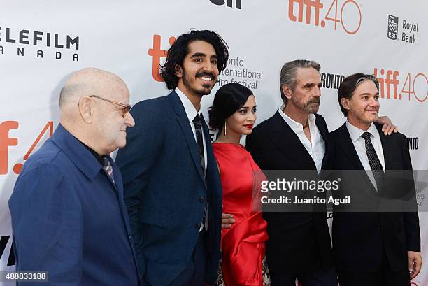 Producer Edward R. Pressman, actor Dev Patel, actress Devika Bhise, actor Jeremy Irons, director/writer Matt Brown attend the premiere of 'The Man...