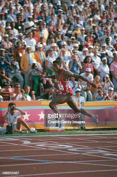 American athlete Carl Lewis winning the Men's 200 metres event at the Los Angeles Memorial Coliseum during the Olympic Games, Los Angeles, 8th August...