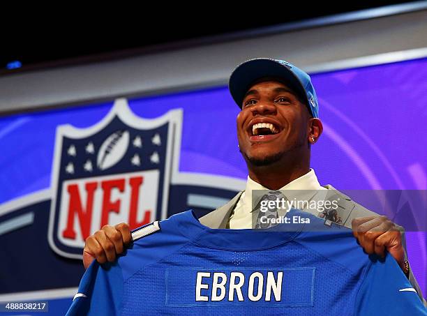 Eric Ebron of the North Carolina Tar Heels poses with a jersey after he was picked overall by the Detroit Lions during the first round of the 2014...