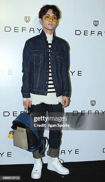 Key of SHINee poses for photographs during the 21DEFAYE flagship store opening event at Sinsa-dong on September 15, 2015 in Seoul, South Korea.