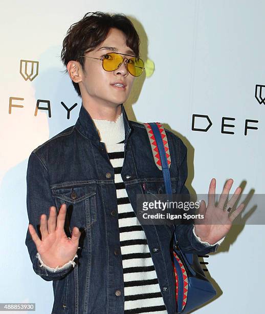 Key of SHINee poses for photographs during the 21DEFAYE flagship store opening event at Sinsa-dong on September 15, 2015 in Seoul, South Korea.