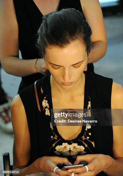 Model prepares backstage during J. Mendel Spring 2016 New York Fashion Week at 330 Hudson St on September 17, 2015 in New York City.