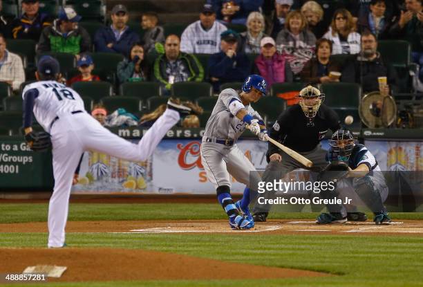 Norichika Aoki of the Kansas City Royals flies out to left against starting pitcher Hisashi Iwakuma of the Seattle Mariners in the first inning at...