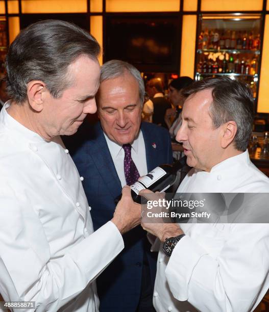 Chef Thomas Keller, Keep Memory Alive foundation Founder Larry Ruvo and chef Daniel Boulud attend the celebration of the opening of db Brasserie at...