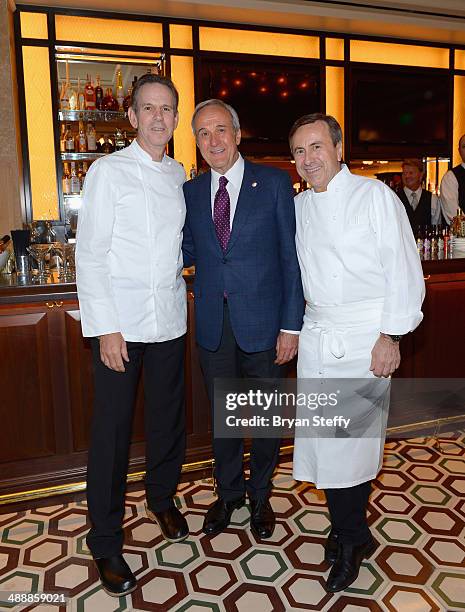 Chef Thomas Keller, Keep Memory Alive foundation Founder Larry Ruvo and chef Daniel Boulud attend the celebration of the opening of db Brasserie at...