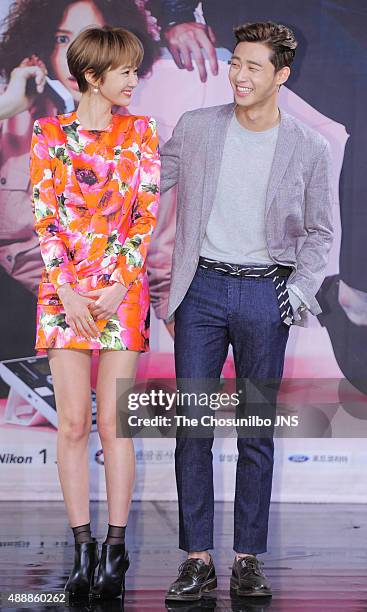 Koh Joon-Hee and Park Seo-Jun pose for photographs during the MBC drama 'She Was Pretty' press conference at MBC on September 14, 2015 in Seoul,...