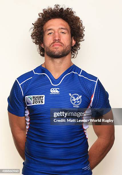 Jacques Burger of Namibia poses for a portrait during the Namibia Rugby World Cup 2015 squad photo call on September 18, 2015 in Cobham, England.