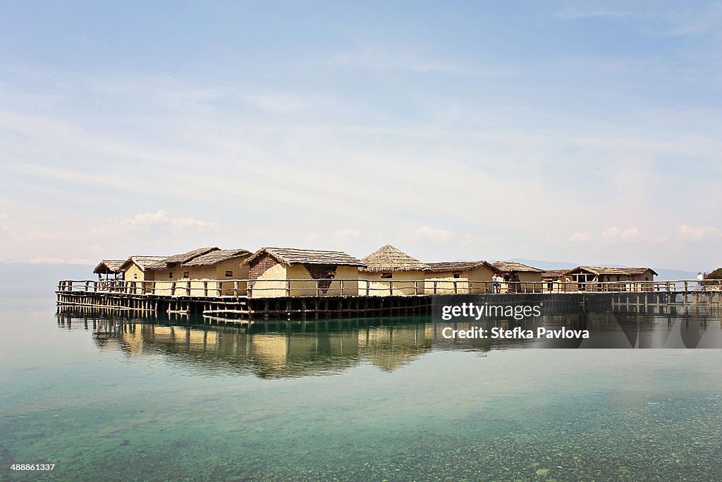 Thatched houses on the water