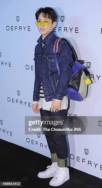 Key of SHINee poses for photographs during the 21DEFAYE flagship store opening event at Sinsa-dong on September 15, 2015 in Seoul, South Korea.