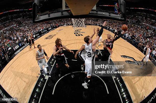 May 8: Damian Lillard of the Portland Trail Blazers goes up for the shot against the San Antonio Spurs during Game Two of the Western Conference...