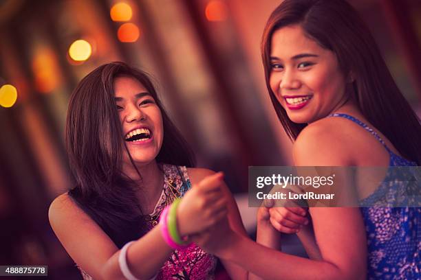 friends out having fun - filipino girl stockfoto's en -beelden