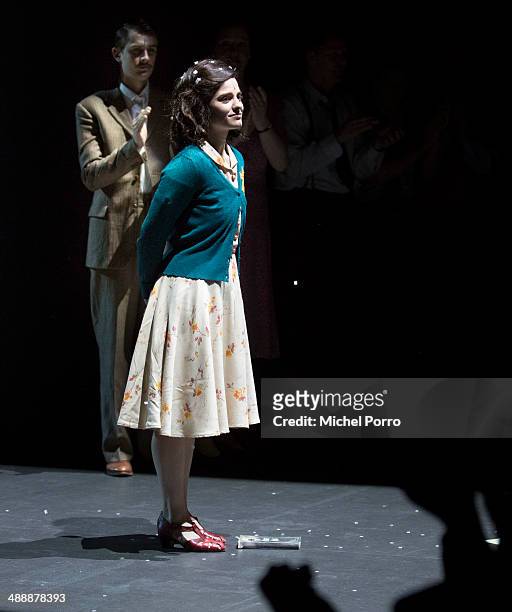 Rosa da Silva as Anne Frank stands behind her diary after the world premiere of "Anne The Play" on May 8, 2014 in Amsterdam, Netherlands.