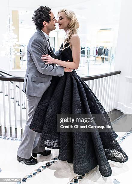 Designer Zac Posen poses with model Marla Weaver during the Zac Posen Pre-Fall And Fall 2014 Collections Preview at Saks Fifth Avenue on May 8, 2014...