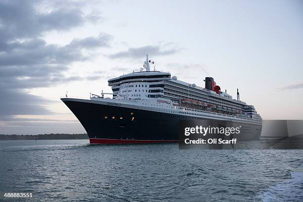 The 'Queen Mary 2' ocean liner sails into dock alongside her sisters ships 'Queen Elizabeth' and 'Queen Victoria' to celebrate her 10th anniversary...