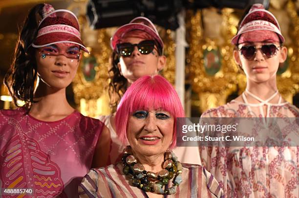 Zandra Rhodes poses with models at her presentation during London Fashion Week Spring/Summer 2016 on September 18, 2015 in London, England.